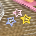 Detail of colorful star-shaped metal hair clips in pink, purple and yellow matte finish - Pink Yellow And Purple Style (23595B)