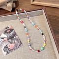Detail of colorful handmade beaded necklace with glass beads and lobster clasp in warm setup - Multi-color Mixed Round Bead Style (4# 23643A)