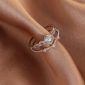 Macro detail of silver ring set featuring opal center stone and micro-pave crystals - Silver Hollow Out Vintage Style (23941)