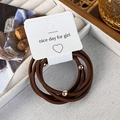 Macro detail of brown high-elastic hair ties with small gold beads on a paper card - Set of 5 / Dark Coffee