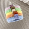Close-up of five colorful plush hair ties with matte ocean-themed square charms - Light Color Style (24227A)