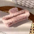 Close-up of soft pink plush hair claw clip with fluffy faux fur texture for winter - Long Gripper / Pink