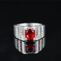 Titanium steel ring with oval red gemstone and pavé accents on polished silver band - US 7 / Ruby Style
