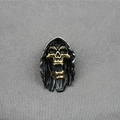 Gothic skull ring in dark steel with gold tooth detail on a grey textured background - Pendant Only (Without Chain)
