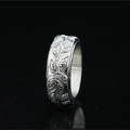 Polished silver stainless steel band ring with embossed Eye of Horus pattern - US 7 / Steel