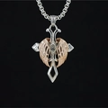 Noordse kruisvleugel hanger ketting met zirkonia steen op een zilverkleurige boxketting - Rozegouden Vleugel Hanger Met Ketting