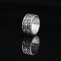 Vintage stainless steel Eye of Horus and Ankh ring with Egyptian relief on black background - US 7