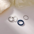 Set of 4 minimalist rings featuring silver chain link and marble resin textures - Blue