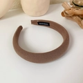 Close-up of brown padded sponge headband with handmade label and twill fabric texture - Light Coffee