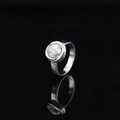Minimalist silver ring with round white turquoise gemstone on black reflective surface - US 6 / Silver Tone White Turquoise