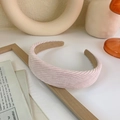 Detail of pink corduroy headband showing ribbed texture and soft non-slip velvet lining - Pink