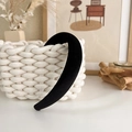 Detail of a thick black velvet padded headband on a woven basket for a vintage French style - Black Suede (19347F)