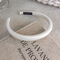 Detail of handmade cream padded sponge headband with satin texture on vintage book - Simple Satin Style (22206A)