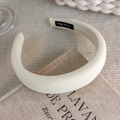 Detail of handmade cream padded headband with linen texture and black hand made label - Padded Filled Style (22451A)