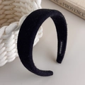Detail of handmade black padded headband with woven wool texture and internal logo label - Black Woolen Padded Puffy (27562F)