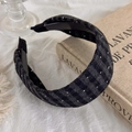 Detail of grey checkered headband with small white embellishments on vintage book - Dark Gray Checkerboard Pattern (27510B)