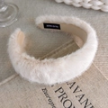 Detail of handmade cream faux fur headband showing plush texture and inner label - Faux Fur Padded Style (24521A)
