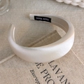Close-up of beige cream padded headband with satin texture and handmade inner label - Satin Wide Style (26475A)