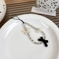 Detail of beaded phone strap with white butterfly charms and black ribbon bow design - Black Bow (21834)