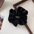 Detail of a large black velvet scrunchie with French vintage pleats and soft texture - Style A Solid Color