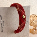 Close-up of vintage burgundy plaid plush headband with a gold Hand Made metal tag - Dark Red Woolen Retro Plaid Style (16# 26430B)
