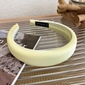 Detail of light yellow satin sponge headband with fine Hand Made inner label texture - Bright Yellow