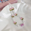 Détail d'une lanière de téléphone en perles de tulipe rose sur plateau en céramique - Type A Violet (Couleurs de Perles Aléatoires)