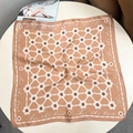 Detail of blue floral silk scarf featuring elegant white patterns and soft camel tones - 53x53 / Khaki with Flower