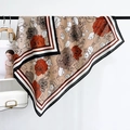 Detail of vintage rose floral silk scarf with contrasting borders and brown tones - Khaki