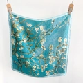 Detailed macro view of Van Gogh Almond Blossom print on satin silk square scarf - Blue