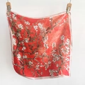 Detail view of red square silk scarf with white almond blossom print in Van Gogh art style - Red