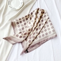 Close-up of silk scarf with polka dot patterns and striped borders in beige and brown - 70cmx70cm / Apricot