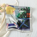 Detailed view of square silk scarf featuring colorful art illustration and grey border - Gentle Leisure