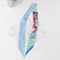 Detail of floral skinny silk scarf with colorful horse print on a white textured backdrop - Block Horse - Blue