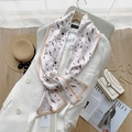 Detail of silk-like scarf with bird print paired with white suit and pearl necklace - 17*150cm / Petrel