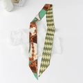 Detail of floral skinny silk scarf with geometric patterns and metallic chain design - Sky Lock - Green