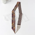 Flat lay of floral silk scarf ribbon with chain patterns on elegant white background - Geometric - Plum Red