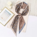 Vintage paisley and plaid patchwork silk-feel skinny scarf tied on a beige top - One Size / Patchwork Blue Pattern (XJPD54-1)