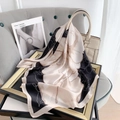 Elegant camellia print square silk scarf draped on a handbag in a stylish setting - Black Pink Camellia Style / 70x70cm