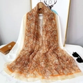 Detail of floral chiffon shawl in orange and brown with sheer fabric texture - Starry Scattered Leaves (YRS150)