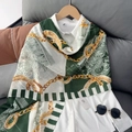 Fashionable cotton linen chain print scarf draped over a white shirt on a hanger - Green