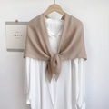 Detail of light brown silk shawl draped over a white shirt on a wooden hanger - Light Coffee