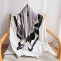 Detail of elegant silk scarf with black and white abstract geometric patterns on a white shirt - 90cmx90cm / Gray
