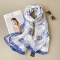 Elegant semi-transparent long silk scarf with blue floral prints and vintage sunglasses - Blue