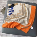 Detail of royal court pattern on orange silk scarf with luxury frayed edges and fringe - 130x130cm / Orange