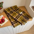 Detail of plaid scarf featuring green and khaki check pattern with soft fringe edges - 60x180cm / Yellow