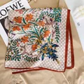 Luxurious floral silk square scarf with lily prints and orange borders on plaid pattern - Red