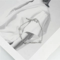 Bracciale minimalista a margherita in acciaio al titanio argento con chiusura regolabile - Color Acciaio