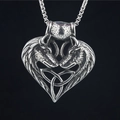 Retro stainless steel heart pendant with dual wolf heads and Celtic knot on black background - Pendant + Matching Chain