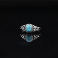 Vintage oxidized titanium steel ring featuring an oval turquoise stone and filigree - US 6 / Turquoise Ring
